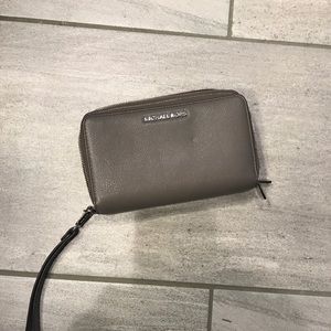 Michael Kors zip wallet.